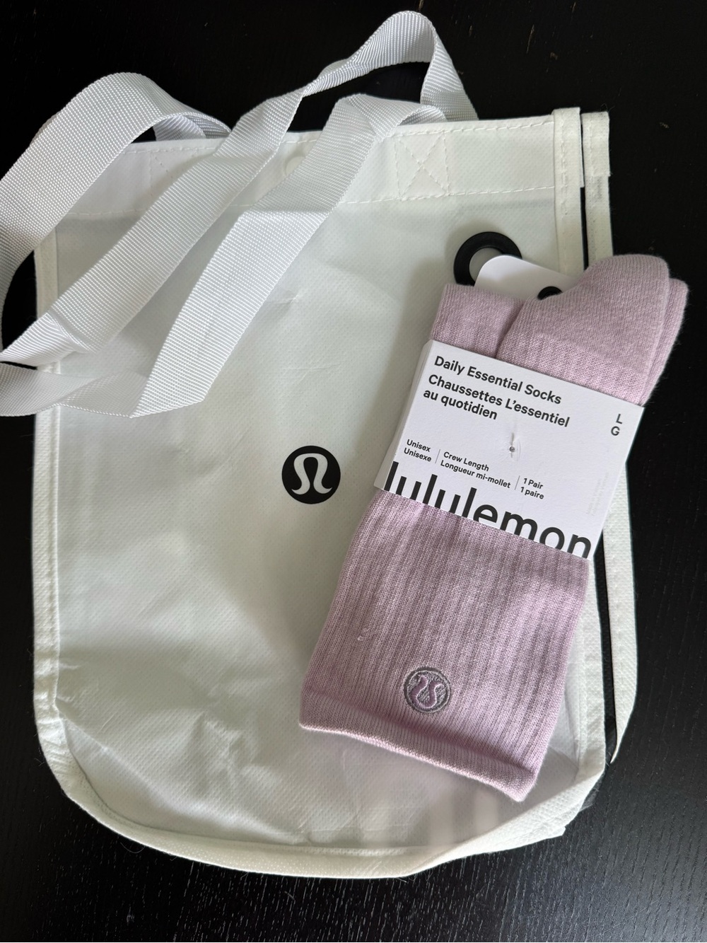 lululemon athletica socks and reusable tote bag